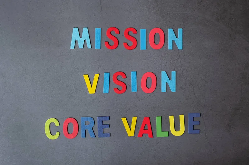 Lettres multicolores formant les mots mission, vision et valeurs